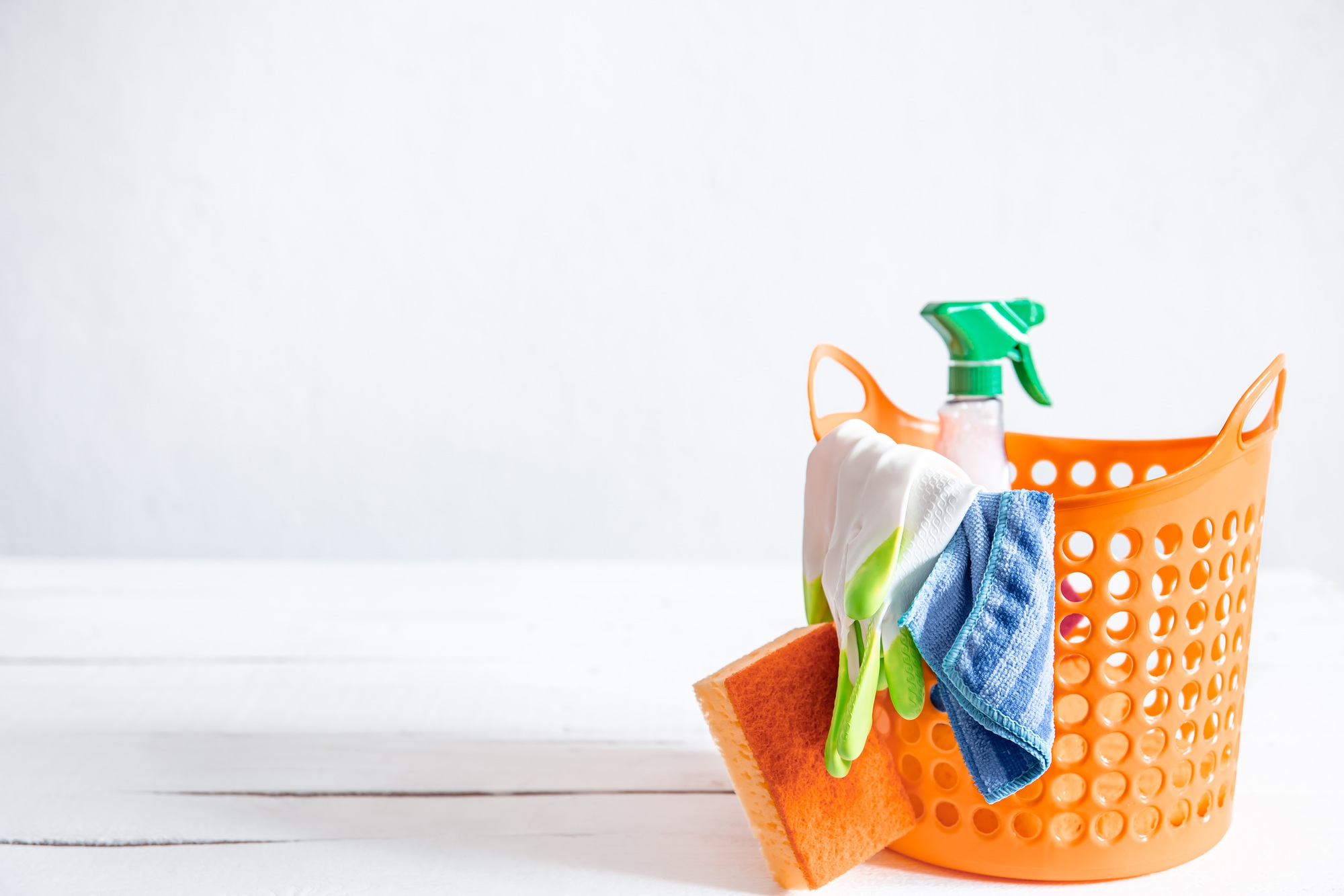 Home cleaning and cleaning basket copy space.
